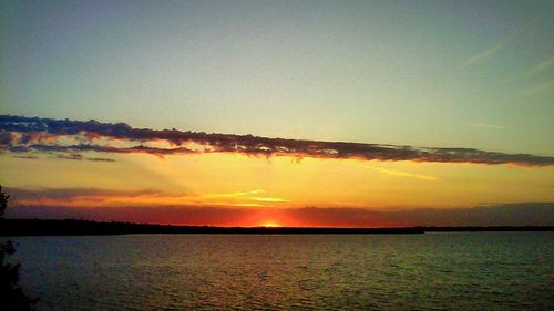 Scenic view of sea at sunset