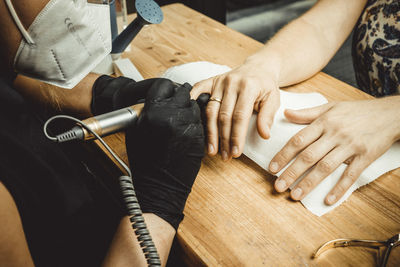 High angle view of man working on table