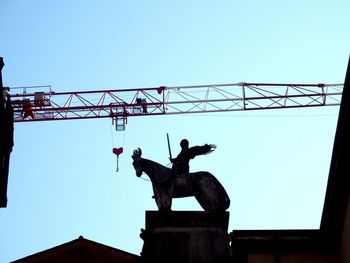 Low angle view of statue against clear sky