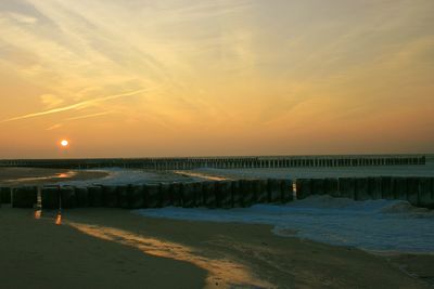 Scenic view of sea at sunset