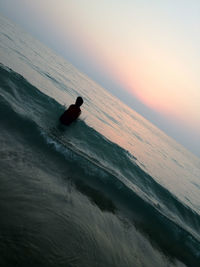 Scenic view of sea at sunset