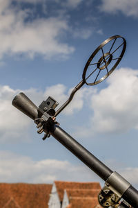 Close-up of basketball hoop against sky