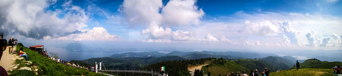 Panoramic view of landscape against cloudy sky