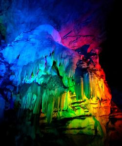 Low angle view of illuminated cave