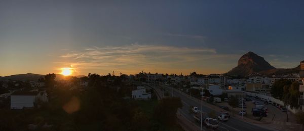 High angle view of buildings against sky during sunset