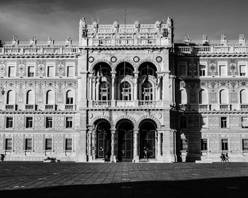 Facade of old building against sky