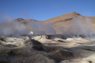 Smoke emitting from volcanic mountain