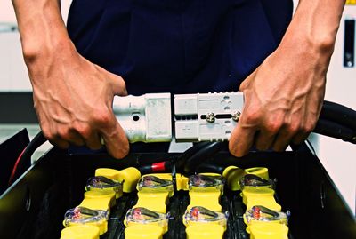 Midsection of man working