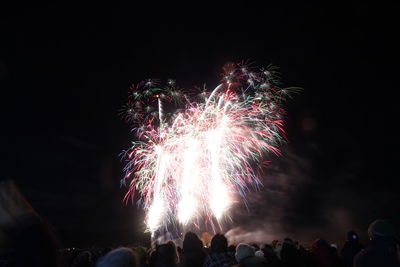 Firework display at night