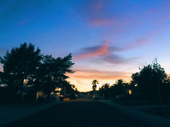 Scenic view of road at sunset
