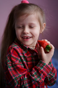 Girl with strawberry berry