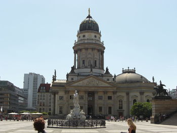 Facade of building against clear sky