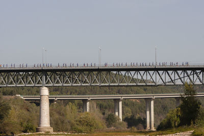 Bridge over river against clear sky