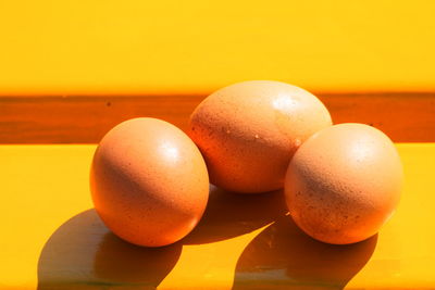 Close-up of eggs in container on table