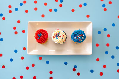 Colorful cupcakes decorated with sprinkles for a patriotic celebration