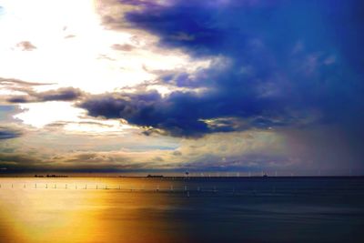 Scenic view of calm sea at sunset