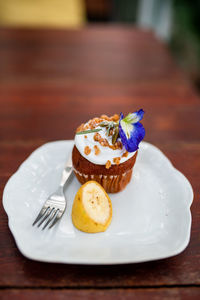 Close-up of cake in plate on table