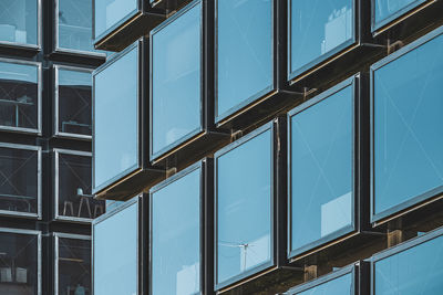 Low angle view of building against blue sky