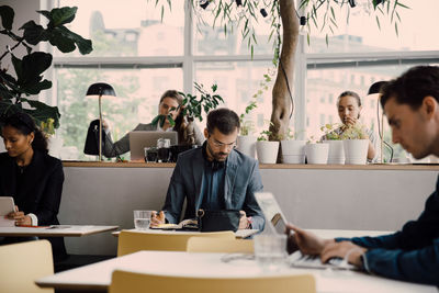 People working at table