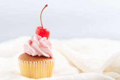 Close-up of cupcakes on cake