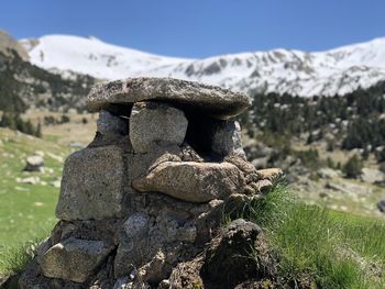 Close-up of chimney tower built of stone stack on rock