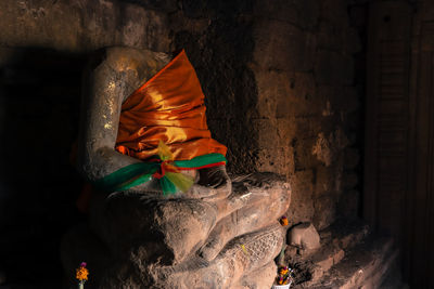 Buddha statue on rock in temple