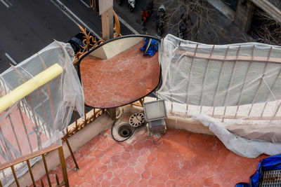 High angle view of mirror and halogen light on balcony