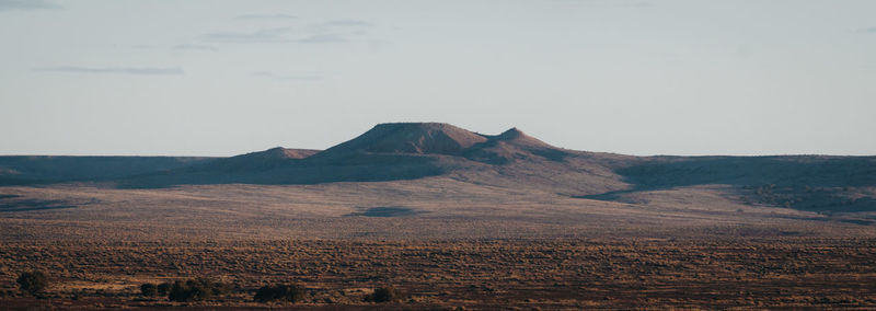 Scenic view of desert against sky