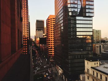 View of skyscrapers at sunset