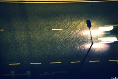 Illuminated road at night