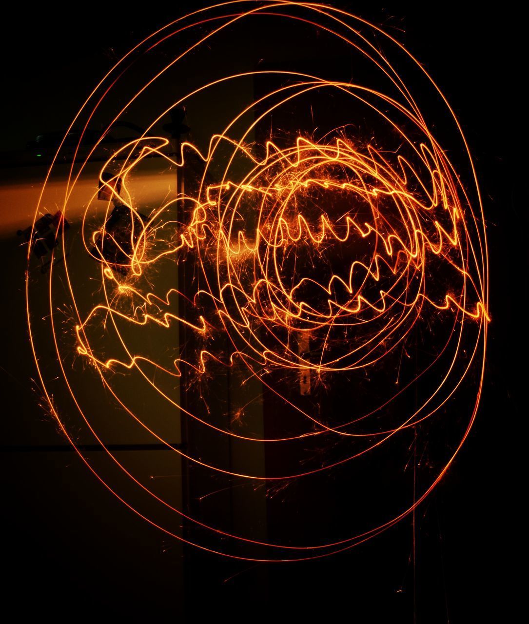 CLOSE-UP OF ILLUMINATED FERRIS WHEEL