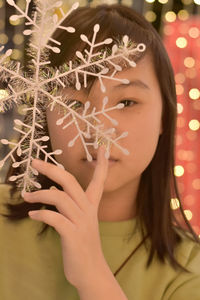 Close-up portrait of a young woman