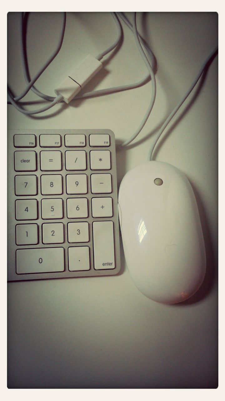 indoors, transfer print, still life, technology, auto post production filter, close-up, table, high angle view, connection, no people, communication, white color, equipment, wireless technology, metal, electricity, healthcare and medicine, studio shot, man made object, home interior