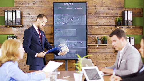 Business colleagues working at office