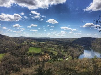 Scenic view of landscape against cloudy sky