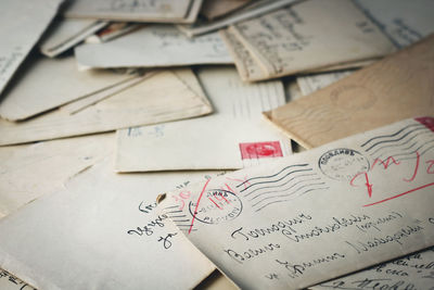 Close-up of letters on table