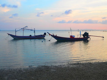 Scenic view of sea at sunset
