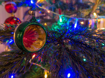 Close-up of illuminated christmas tree at night