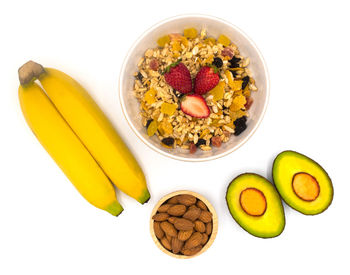 High angle view of breakfast on table against white background
