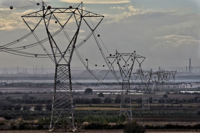 Low angle view of electricity pylon