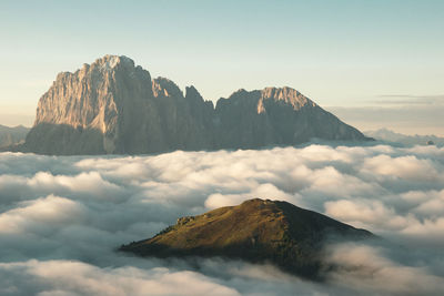 View of mountain range against cloudy sky