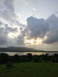 Scenic view of lake against sky during sunset