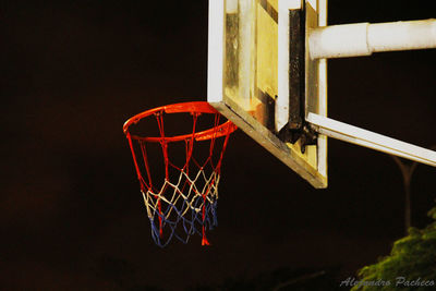Low angle view of illuminated building at night
