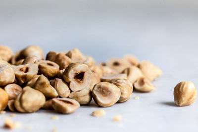 Close-up of roasted coffee beans on table