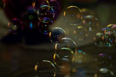 Close-up of bubbles against blurred background