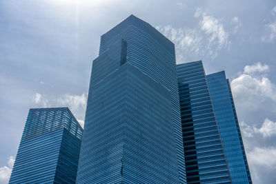 Low angle view of modern buildings against sky