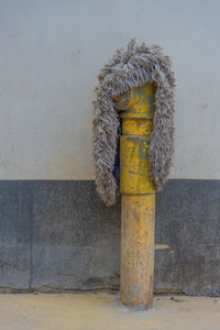 Close-up of rope tied on wall