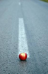 Close-up of strawberry on road