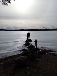 Man looking at sea against sky