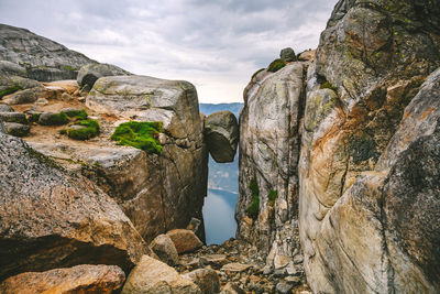 Panoramic view of rock formations against sky